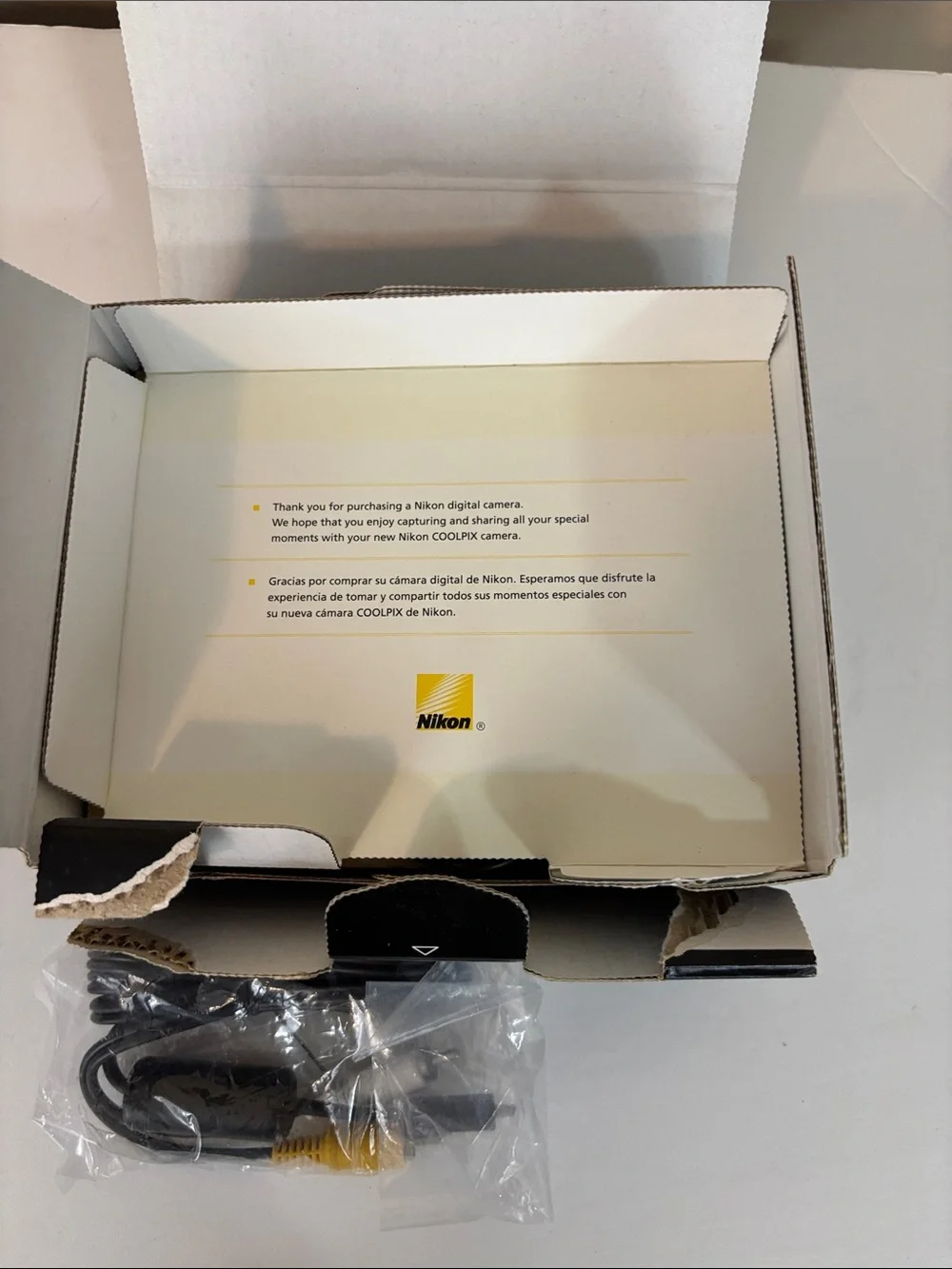Nikon Coolpix S3100 camera with charger box and everything shown